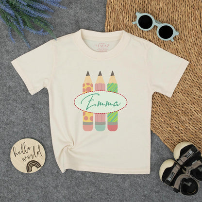 Personalized Kids Back to School Pencil Shirt with Name, whimsical pink polka dot and green striped design for toddler girls first day outfit