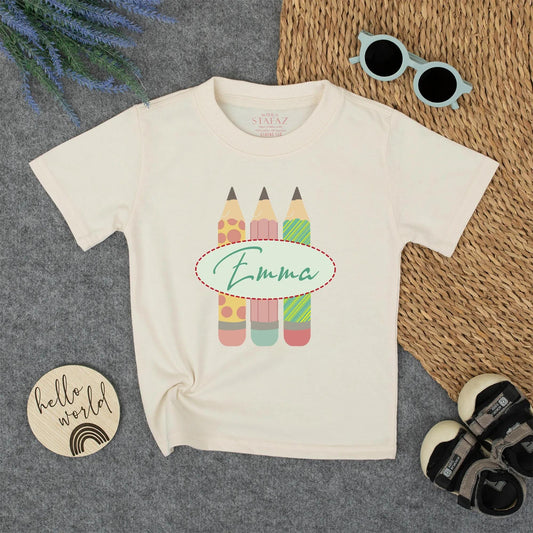 Personalized Kids Back to School Pencil Shirt with Name, whimsical pink polka dot and green striped design for toddler girls first day outfit