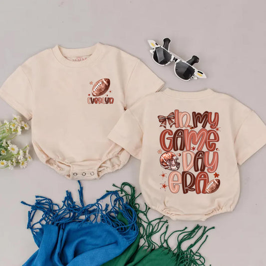 Personalized Game Day Romper: Retro Football Outfit with Custom Name, In My Game Day Era Baby Bodysuit, Football Bow, Perfect Newborn Shower Gift 139