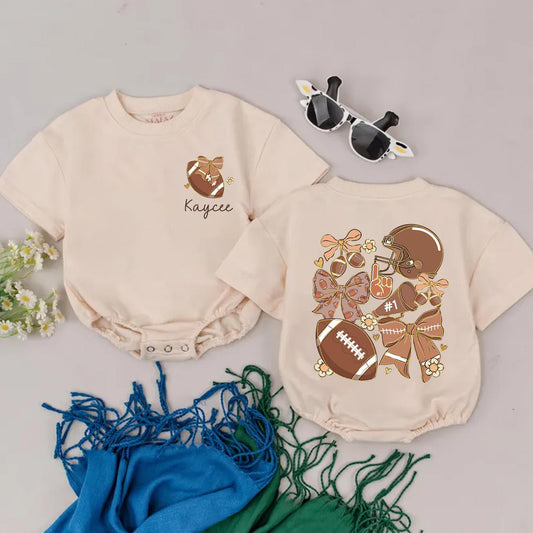 Personalized Game Day Romper: Retro Football Girl Outfit with Name, Bows & Flowers, Vintage-Inspired Baby Shower Gift for Your Little Football Star (139 chars)