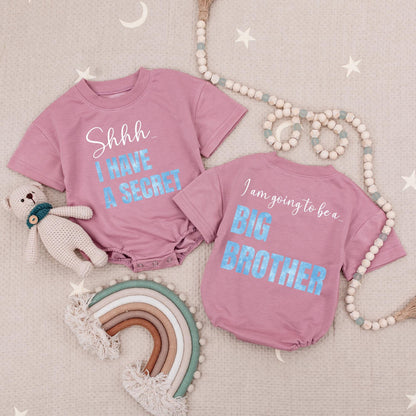 Shhh I Have A Secret Big Brother Announcement Bubble Romper Promoted To Big Brother Typography Design Black Script Light Blue Letters Modern Cute Babysuit