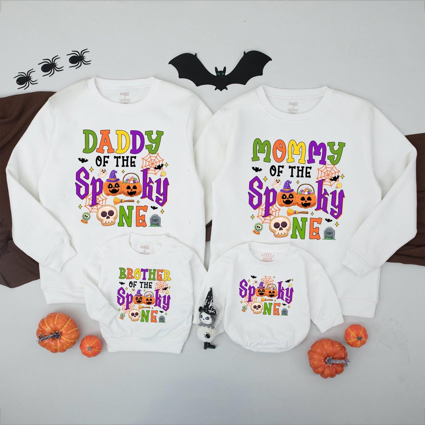 Spooky One Halloween First Birthday Matching Family Sweatshirt for Mom Dad Brother with festive ghosts pumpkins bats and bright colors