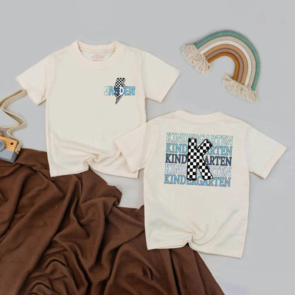 Personalized Boys Kindergarten Shirt Custom Name Back to School T-Shirt Blue Lightning Bolt Checkerboard K Stacked Kindergarten Design