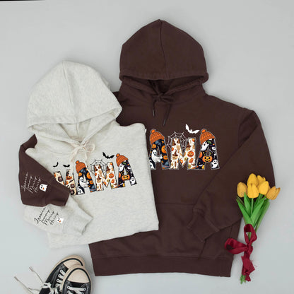 Spooky Season Personalized Mama Sweatshirt: Halloween Ghosts, Bats & Pumpkins Design, Custom Name Sleeve, Festive Mom Hoodie, Comfort & Style, Gift for Her (140)