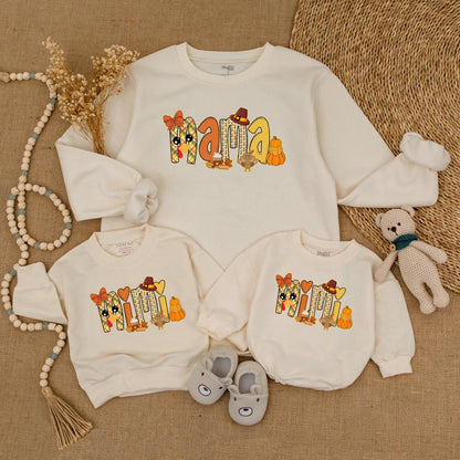 Adorable Mama and Mini Fall Sweatshirts with Playful Pumpkin Turkey Designs Warm Orange Red Colors Perfect for Thanksgiving Family Outings