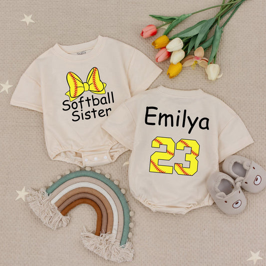Softball Sister Romper: Custom Emilya 23, Little Sister's Game Day Outfit with Softball Bow, Red Stitches, Playful Baby Shower Gift, Cute Babysuit