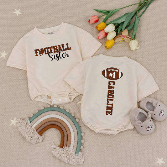 Caroline's #1 Fan Football Sister Baby Bodysuit: Custom Game Day Outfit for Lil' Sis, Cute Sporty Tee, Personalized Football Season Baby Gift Set