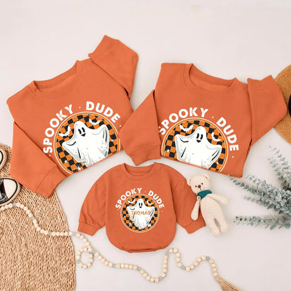 One Spooky Dude Halloween Baby Romper White Ghost Black Orange Checkered Circle Design White Block Letters Scattered Bats Spiders Stars Playful Family Matching Outfit