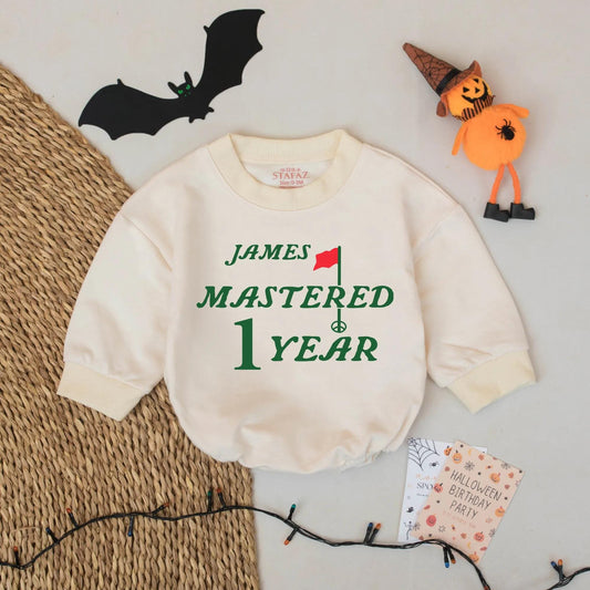 Golf Boy First Birthday Romper with "James Mastered 1 Year" Text Green Font Red Flag and Golf Tee Design Baby Boy Bodysuit Cute Celebration Outfit