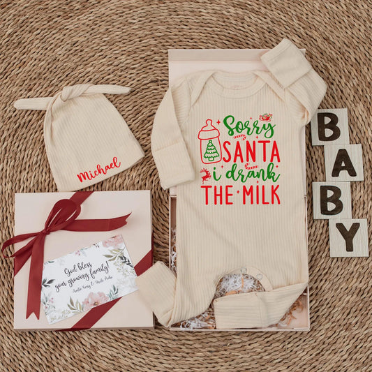 Sorry Santa I Drank The Milk Baby Bodysuit funny Christmas newborn outfit, festive red green design with sleigh reindeer stars and playful script for a baby's first holiday gift.