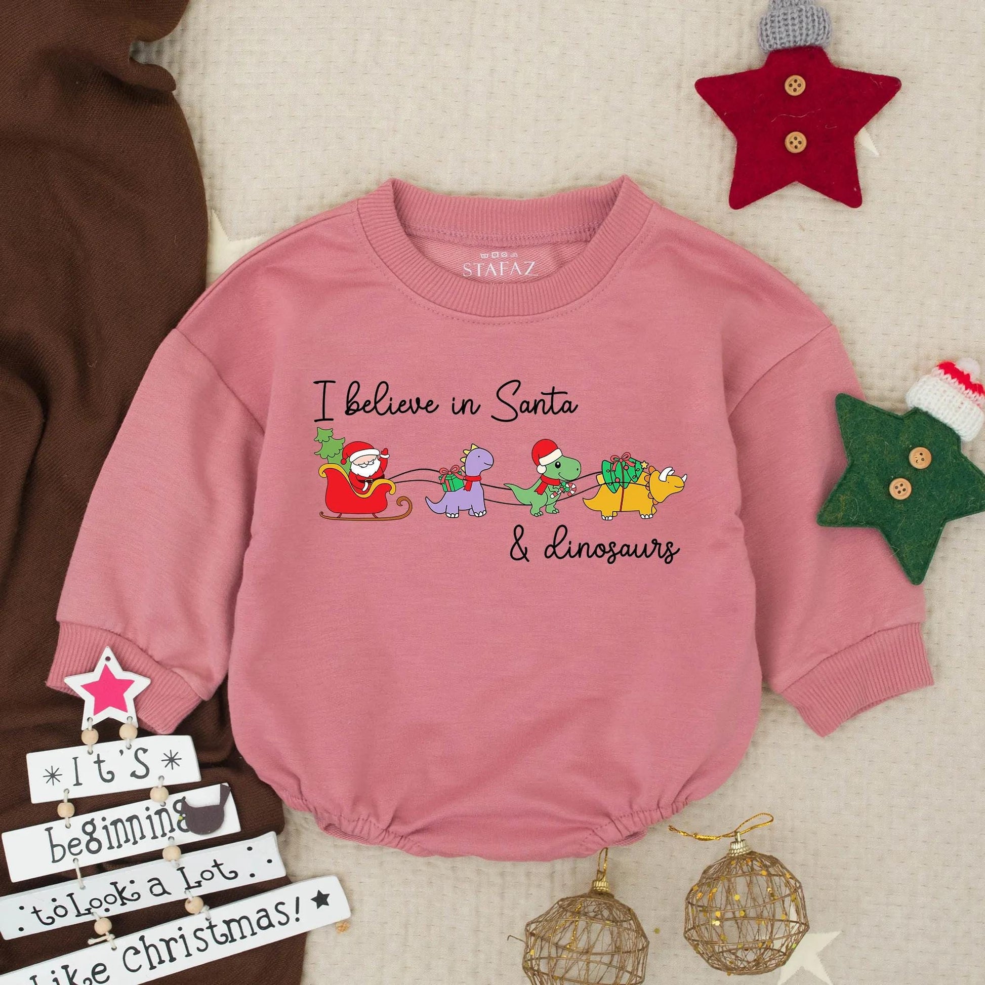 Santa Dinosaur Christmas Romper: I Believe! Funny Toddler Holiday Sweatshirt, Colorful Cartoon Santa Sleigh with Purple, Green & Yellow Dinos Gift Idea (138 chars)