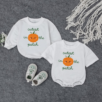 Adorable Baby Fall Pumpkin Sweatshirt Cutest In The Patch Smiling Orange Pumpkin Whimsical Green Text Toddler Autumn Halloween Gift