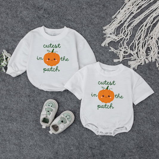 Adorable Baby Fall Pumpkin Sweatshirt Cutest In The Patch Smiling Orange Pumpkin Whimsical Green Text Toddler Autumn Halloween Gift
