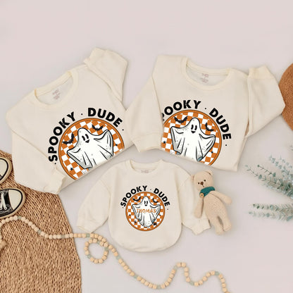 One Spooky Dude Halloween Baby Romper White Ghost Black Orange Checkered Circle Design White Block Letters Scattered Bats Spiders Stars Playful Family Matching Outfit
