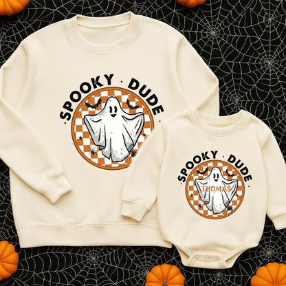 One Spooky Dude Halloween Baby Romper White Ghost Black Orange Checkered Circle Design White Block Letters Scattered Bats Spiders Stars Playful Family Matching Outfit