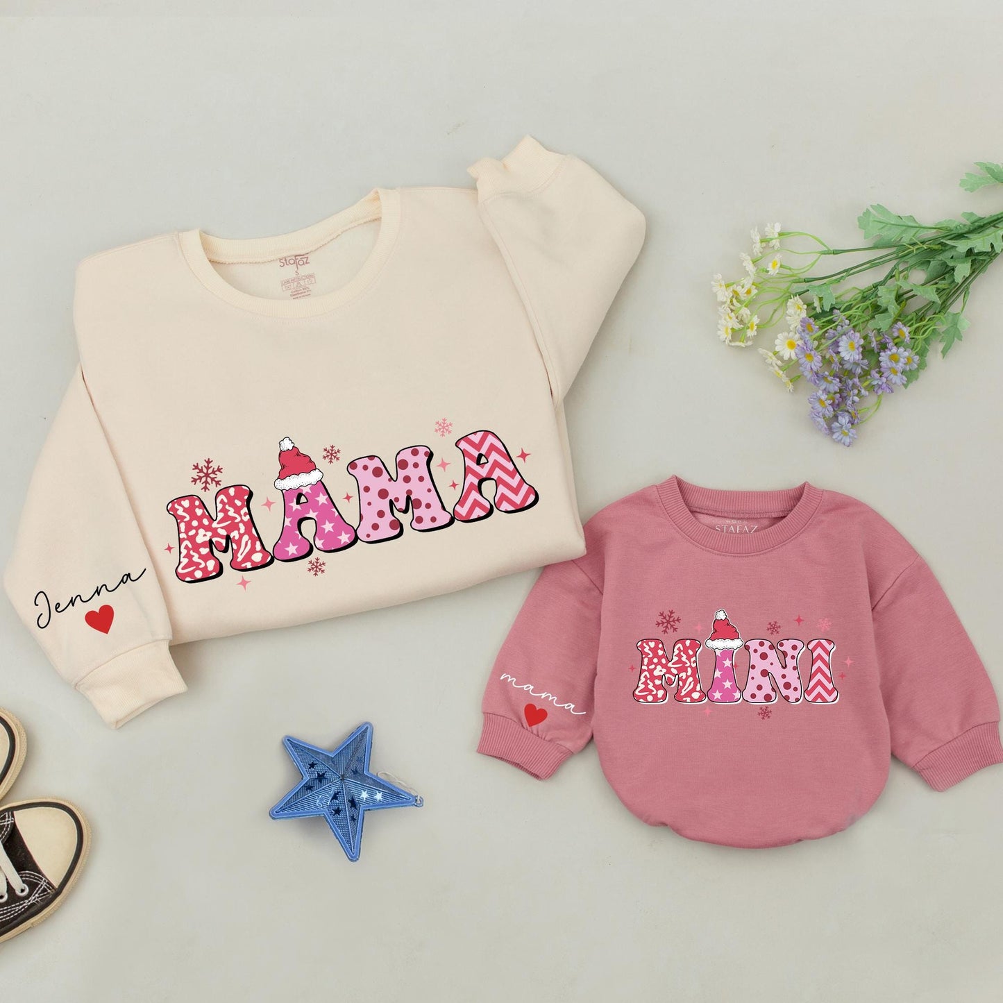 Personalized Retro Pink Mommy and Me Christmas Sweatshirt Set with Patterned Block Letters, Santa Hats, Snowflakes, Custom Name Heart Sleeve