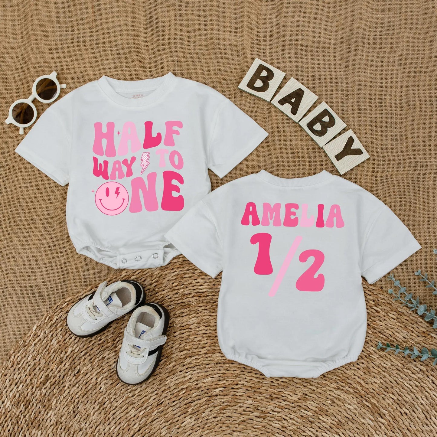 Personalized Pink Half Way to One Baby Girl Romper with Custom Name, Playful Smiley Face Lightning Bolt 6 Month Milestone Bubble Bodysuit