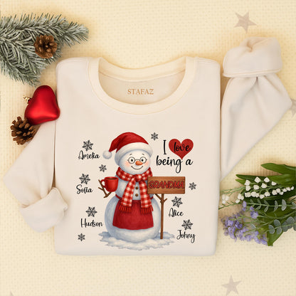 Personalized Grandma Christmas Snowman Sweatshirt with Grandchildren's Names, a cozy holiday sweater for Mom, a loving 'I ❤️ being a Grandma' shirt