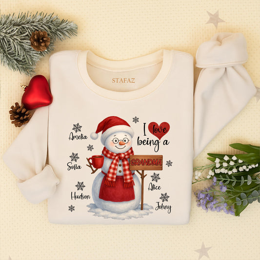 Personalized Grandma Christmas Snowman Sweatshirt with Grandchildren's Names, a cozy holiday sweater for Mom, a loving 'I ❤️ being a Grandma' shirt
