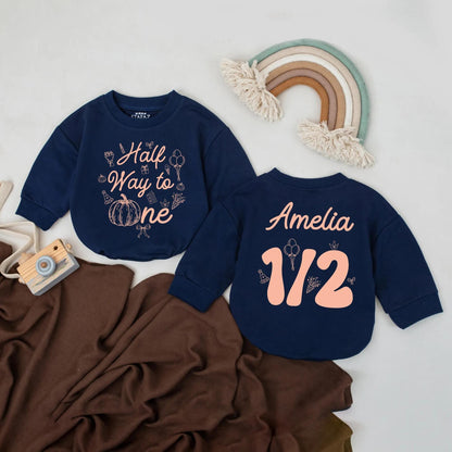 Personalized Half Way to One Pumpkin Bubble Romper with warm orange fall graphics festive half birthday celebration outfit for baby girl boy