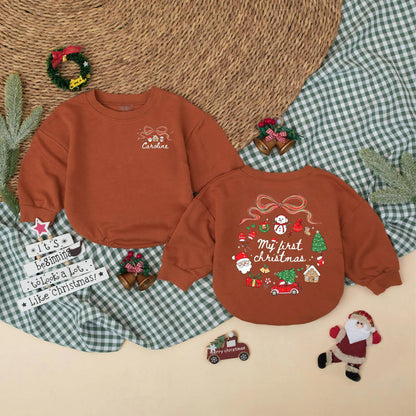 Personalized My First Christmas Bubble Romper Baby Girl adorable holiday outfit with festive bow snowman Santa tree graphics for a precious Christmas photo memory