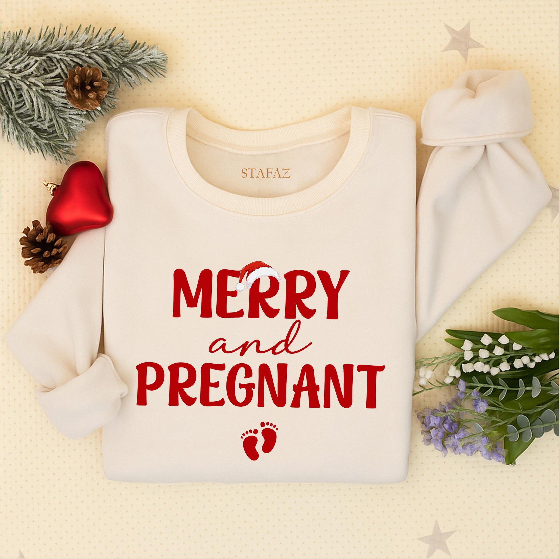 Merry and Pregnant Christmas Sweatshirt: Festive Holiday Pregnancy Announcement!  Comfy Xmas Outfit for Expecting Moms, Cute Baby Footprints Design, Red Lettering (138 chars)