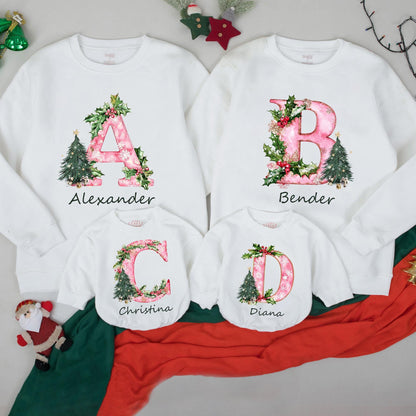 Personalized Christmas Family Sweatshirt with Initial Name Holiday Design Festive Pink Pattern Holly Berries Tree Cozy Thoughtful Present