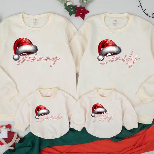 Personalized Christmas Family Sweatshirt with Santa Hat Name Design Festive Holiday Matching Xmas Outfits for Mom Dad Kids Playful Celebration Gear