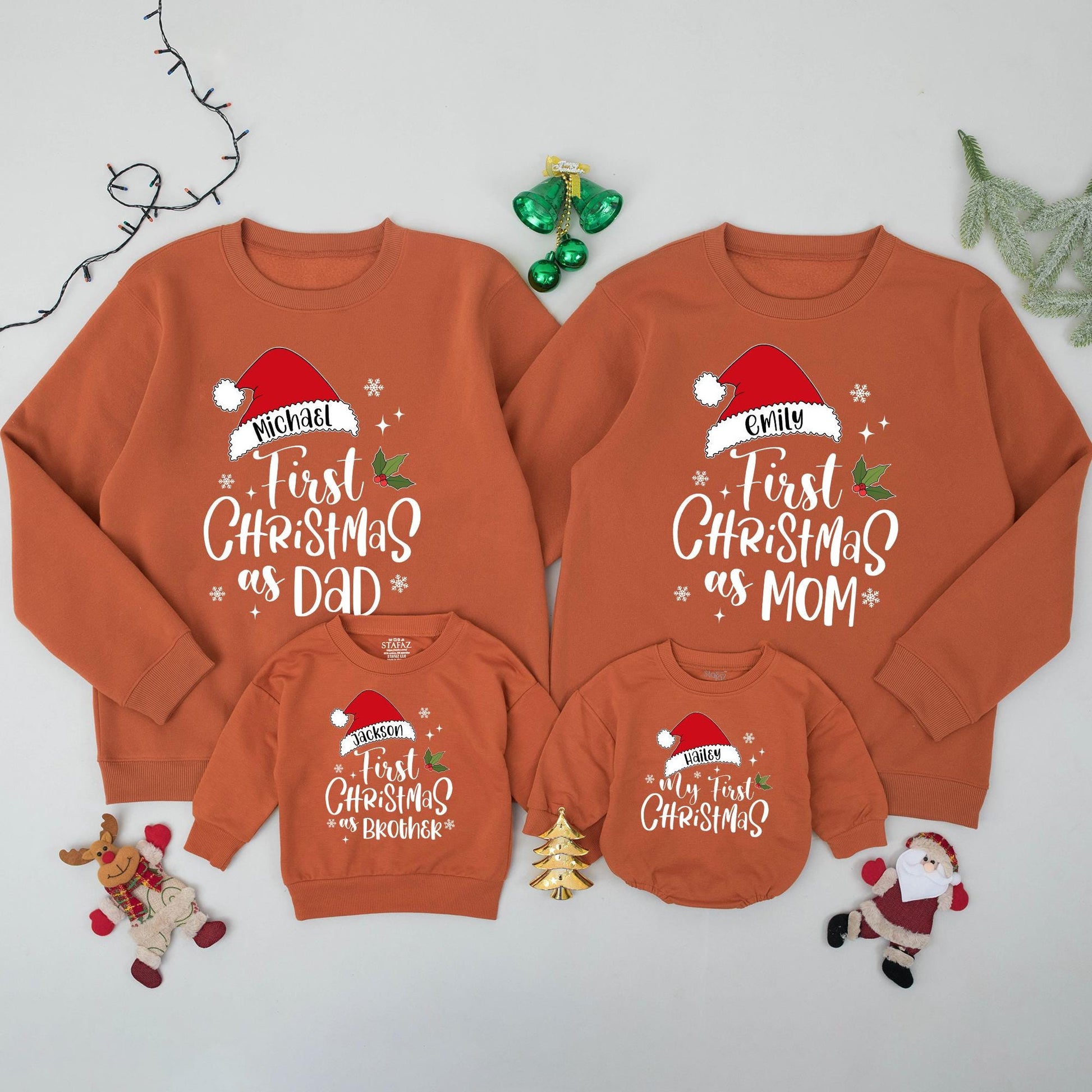 Personalized Family Christmas Sweatshirts for Baby's My First Christmas featuring Santa Hat names, Dad Mom Brother matching festive red green sweaters