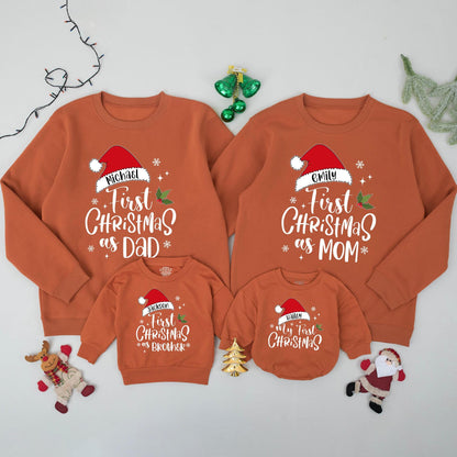 Personalized Family Christmas Sweatshirts for Baby's My First Christmas featuring Santa Hat names, Dad Mom Brother matching festive red green sweaters