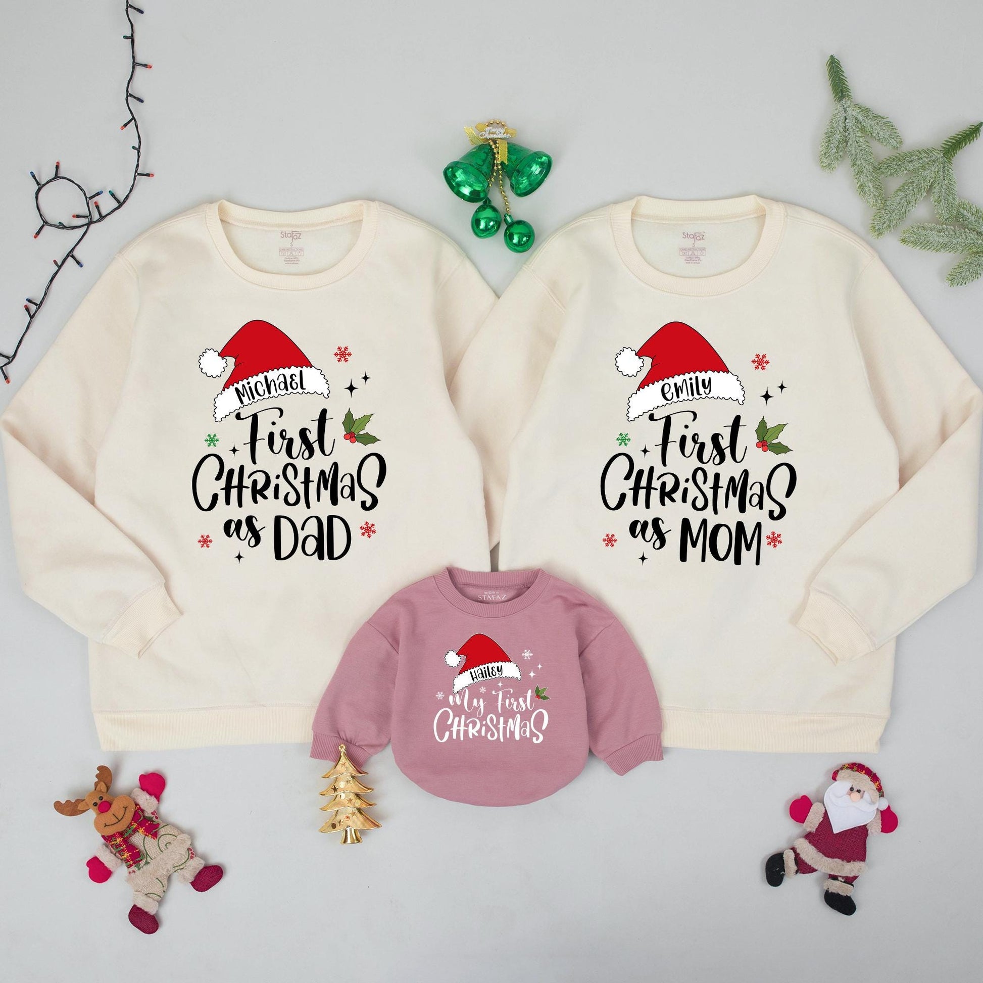 Personalized Family Christmas Sweatshirts for Baby's My First Christmas featuring Santa Hat names, Dad Mom Brother matching festive red green sweaters