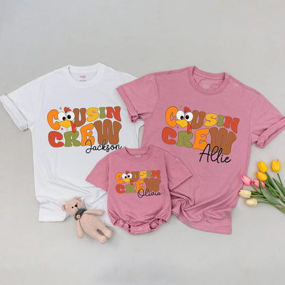 Personalized Cousin Crew Thanksgiving Matching Shirt with Names Retro Bubbly Turkey Design Star Accents Warm Palette Family Dinner Holiday Gift