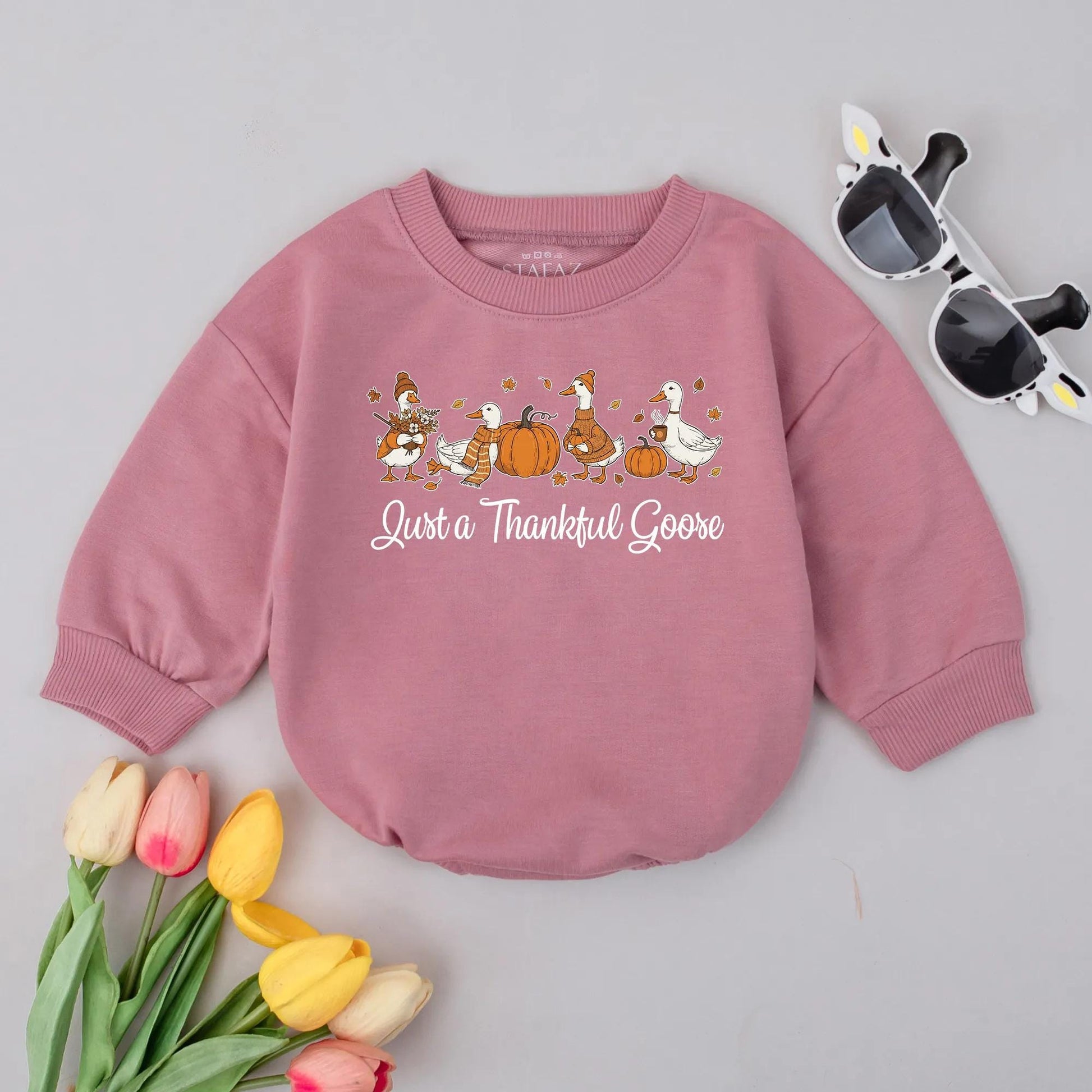 Just a Thankful Goose Baby Bubble Romper, charming Fall geese, pumpkins, and autumn leaves, a cozy Thanksgiving outfit for newborns.