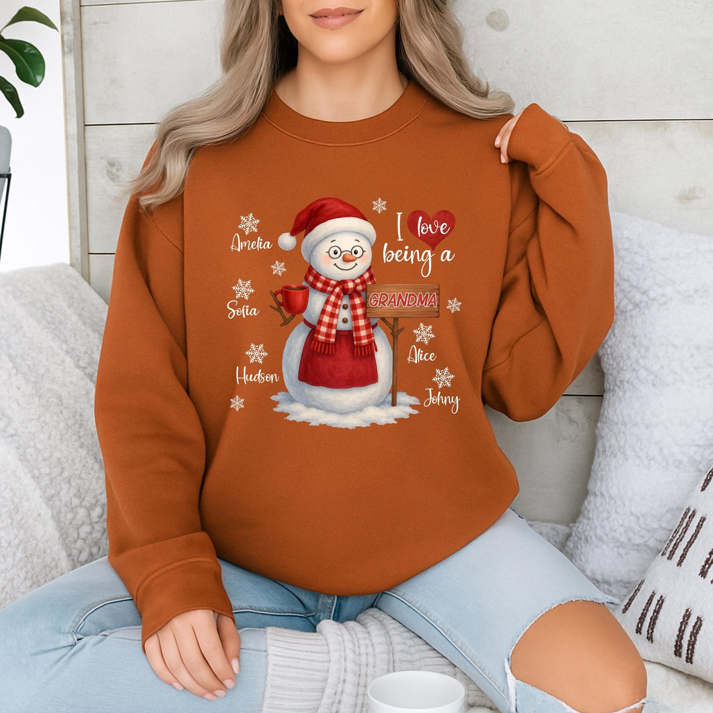 Personalized Grandma Christmas Snowman Sweatshirt with Grandchildren's Names, a cozy holiday sweater for Mom, a loving 'I ❤️ being a Grandma' shirt