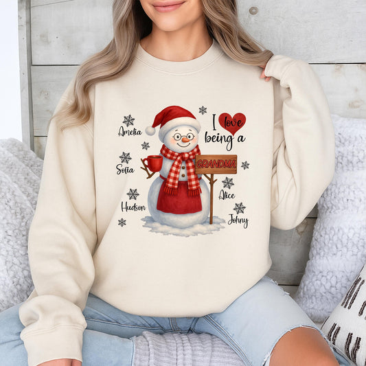 Personalized Grandma Christmas Snowman Sweatshirt with Grandchildren's Names, a cozy holiday sweater for Mom, a loving 'I ❤️ being a Grandma' shirt
