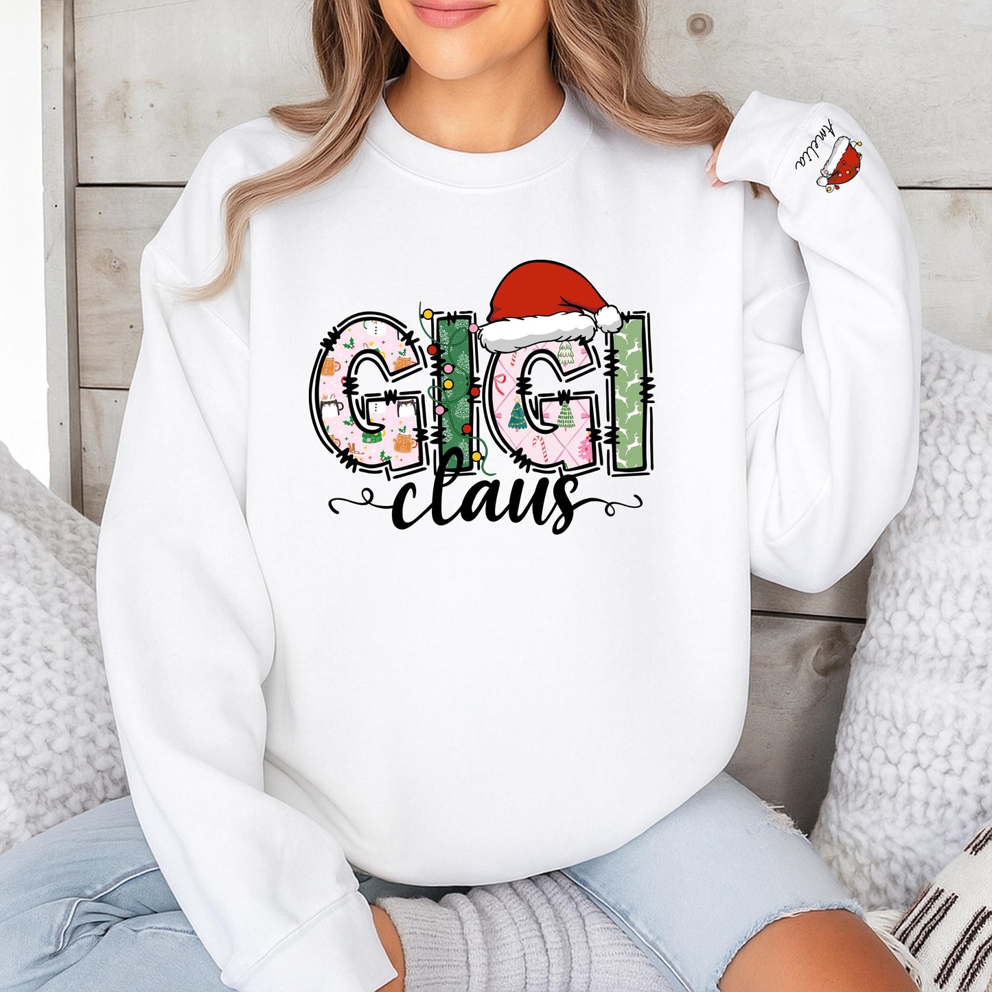 Personalized Gigi Claus Christmas Sweatshirt with Grandkids Names on Sleeve featuring festive patterned pink green white graphics comfy gift