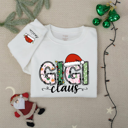 Personalized Gigi Claus Christmas Sweatshirt with Grandkids Names on Sleeve featuring festive patterned pink green white graphics comfy gift