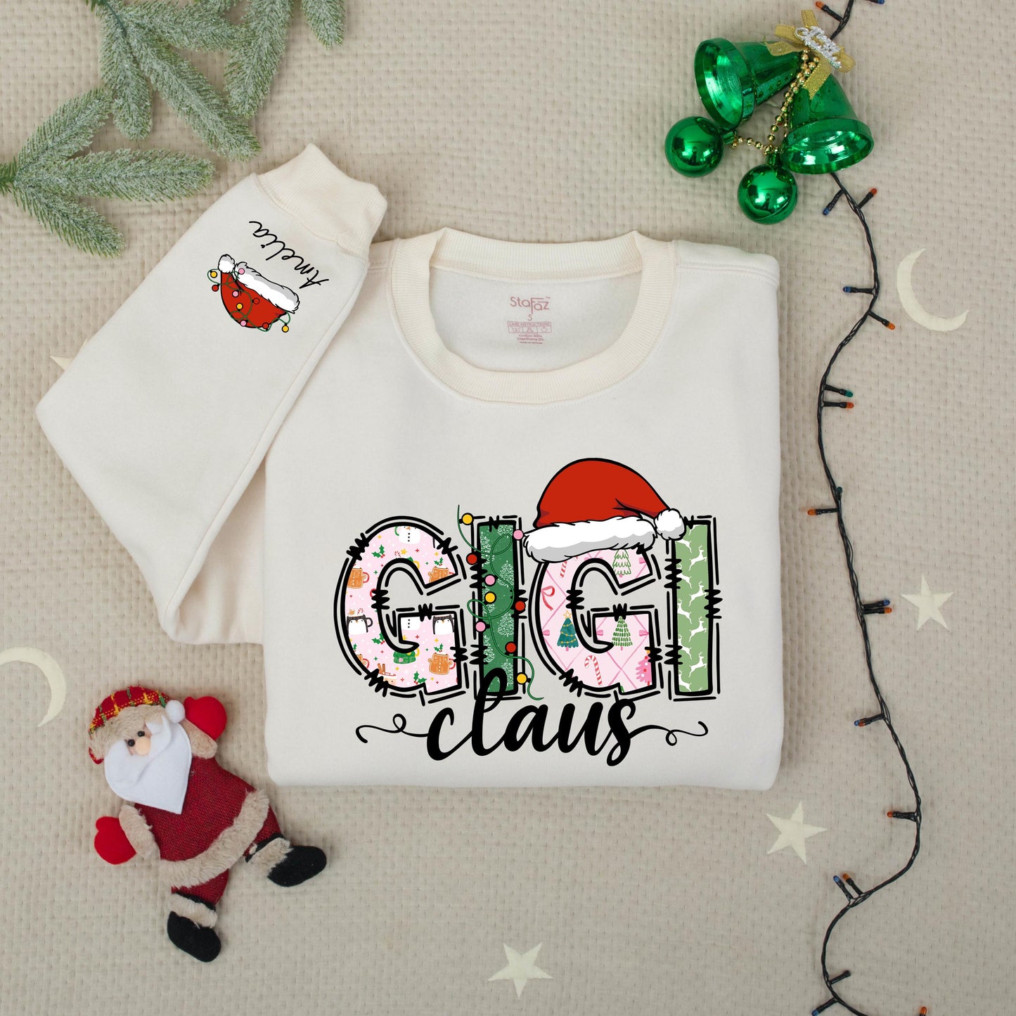 Personalized Gigi Claus Christmas Sweatshirt with Grandkids Names on Sleeve featuring festive patterned pink green white graphics comfy gift