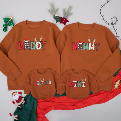 Personalized Matching Family Christmas Sweatshirt with Festive Reindeer Lettering featuring Santa Hats and Cozy Holiday Patterns for Xmas PJs