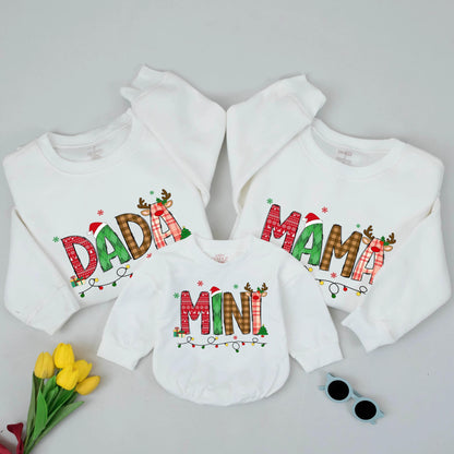 Festive Christmas Mama Mini Matching Family Sweatshirt with Playful Patterned Letters Santa Hats Reindeer Antlers Presents Trees Holiday Celebration