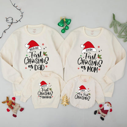Personalized Family Christmas Sweatshirts for Baby's My First Christmas featuring Santa Hat names, Dad Mom Brother matching festive red green sweaters
