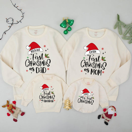 Personalized Family Christmas Sweatshirts for Baby's My First Christmas featuring Santa Hat names, Dad Mom Brother matching festive red green sweaters