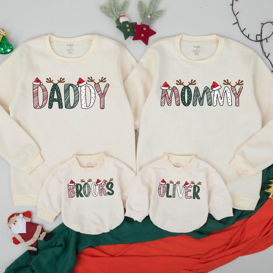 Personalized Christmas Family Sweatshirts Daddy Mommy Custom Names with Reindeer Antlers and Santa Hats Festive Holiday Outfits for Mom Dad and Kids