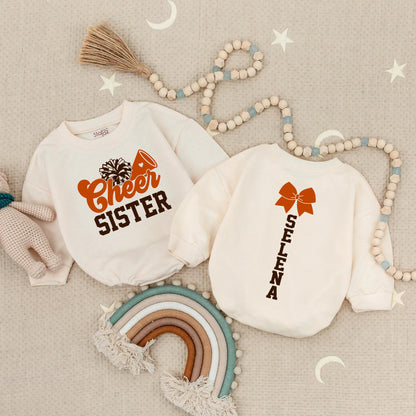 Custom Cheer Sister Romper: Name & Number Personalized Cheerleading Outfit, Cute Game Day Baby Romper Football Design, Adorable Gift, Soft Cotton, 135 chars