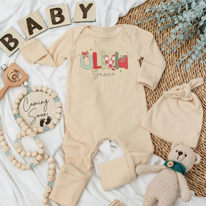 Personalized Christmas Baby Bodysuit featuring festive red green patterns like gingham plaid and polka dot letters for a newborn holiday outfit First Christmas gift
