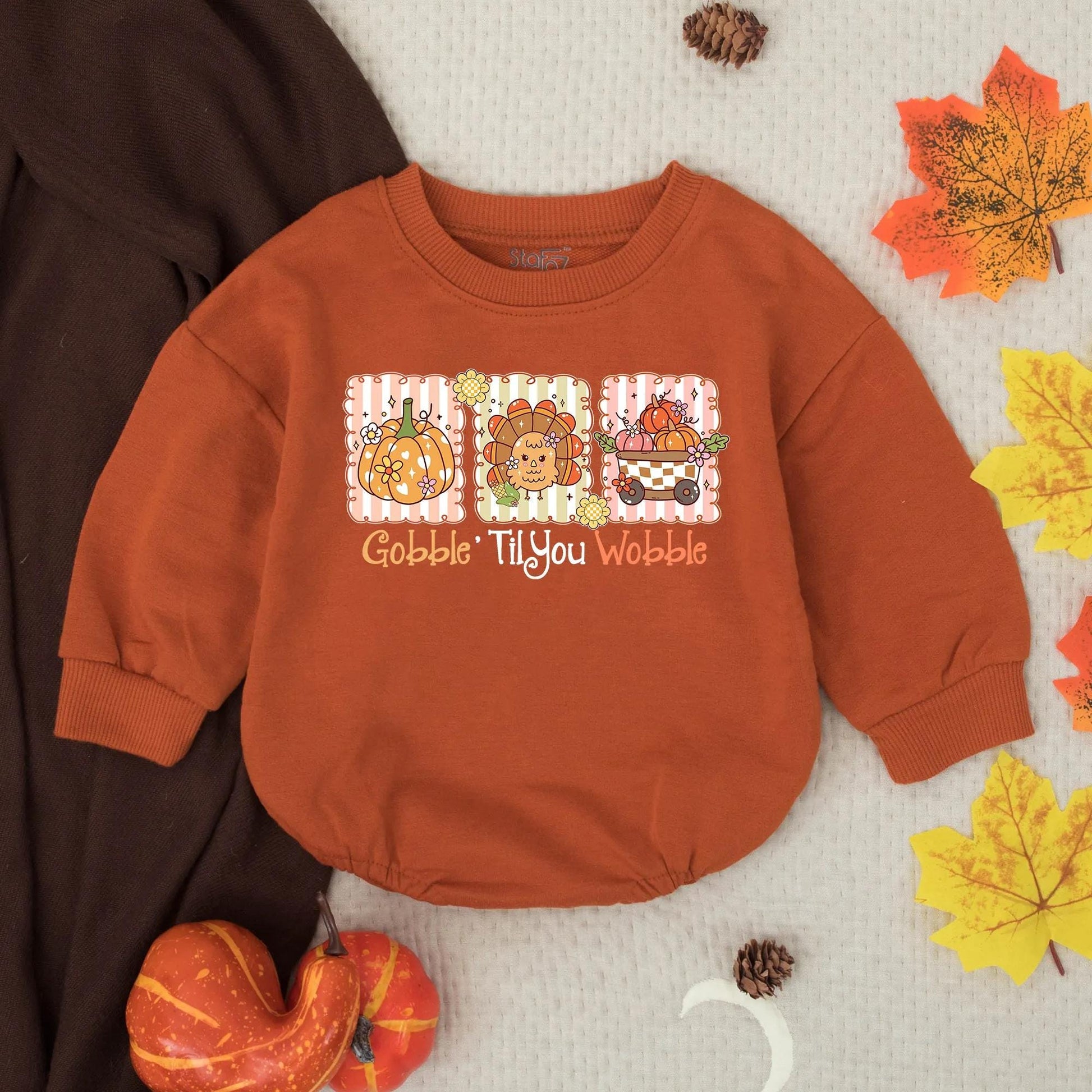 Gobble Til You Wobble Thanksgiving Baby Bubble Romper funny cute infant toddler outfit with whimsical pumpkin turkey flower wagon design orange pink brown colors