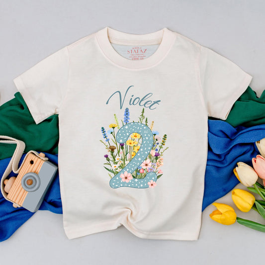 Personalized Violet Wildflower Two Birthday T-Shirt for Girls, Floral 2nd Birthday Party Toddler Outfit with Starry Blue Number 2 and Whimsical Blooms Cotton Comfortable Gift Idea