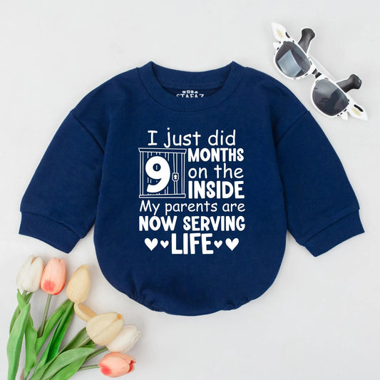 Funny Newborn Baby '9 Months On The Inside' Romper with Jail Bar Design Padlock Detail & 'Parents Serving Life' Text. Perfect Coming Home Outfit or Baby Announcement Gift Bodysuit.