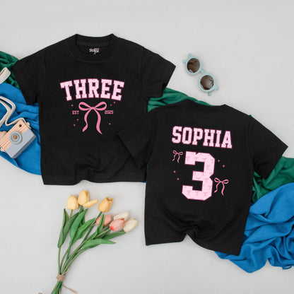 Personalized Three Birthday Girl Pink Bow Collegiate Third Birthday Outfit Toddler Tee Sophia 3 White Ink Stars EST 2025 Fun Gift