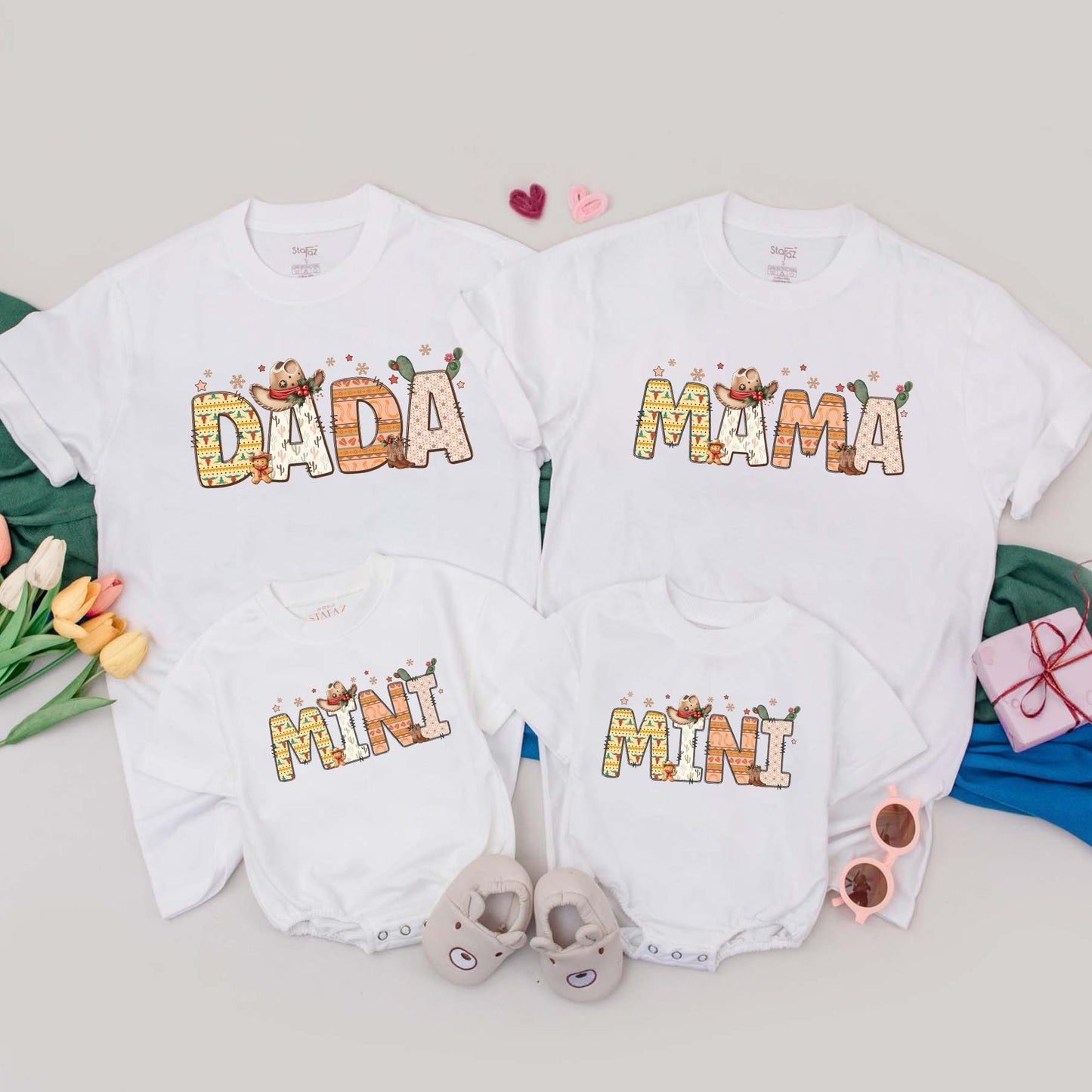 Personalized Howdy Christmas Family T-Shirt Retro Southwestern Desert Vibes DADA MAMA MINI Cowboy Boots Cacti Stars Warm Tones Vintage Western Holiday Gift